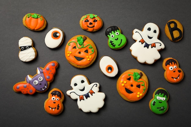 Photo concept of halloween sweets funny sweets top view