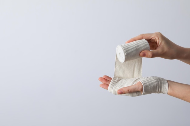 Concept of hand injury help with elastic bandage