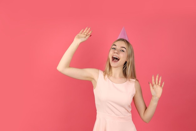 Concept of Happy Birthday young woman on pink background