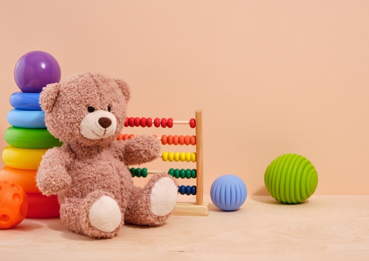 Photo concept of the happy and fun childhood cute toys for children copy space for text