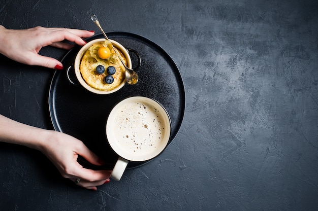 Concept healthy Breakfast, rice pudding and a Cup of coffee. 