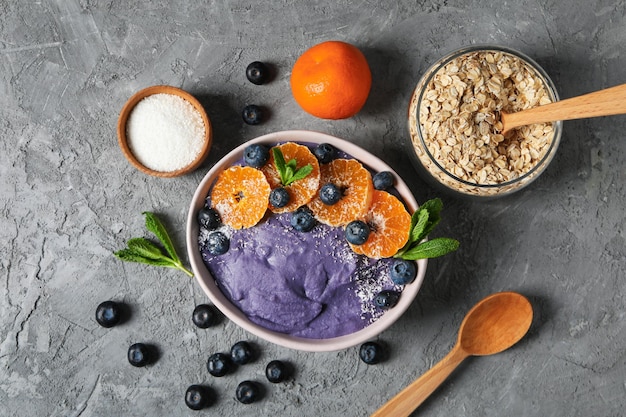 Photo concept of healthy food with acai smoothie top view