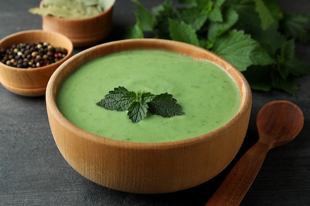 Concept of healthy food with nettle soup, close up