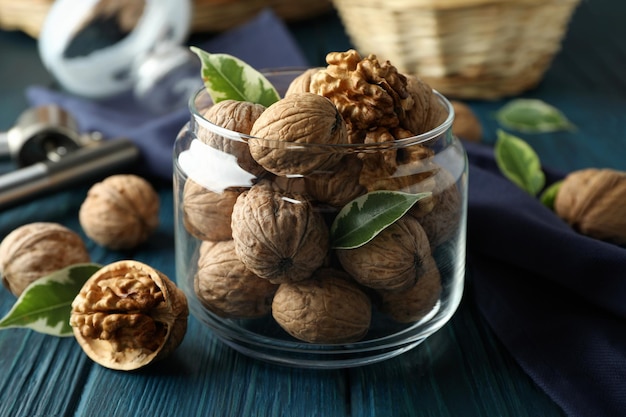 Concept of healthy food with walnuts on wooden background