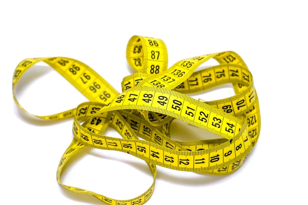 健康的なライフスタイル、スポーツ、フィットネスとダイエット、健康的な食事、黄色の測定タップの概念