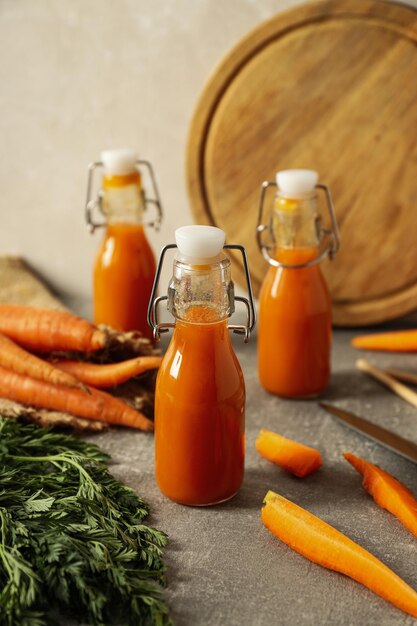 Concept of healthy nutrition and diet with carrot juice