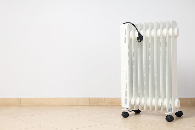 Concept of heating season modern electric heater in room