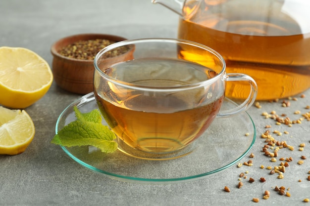 Concept of hot drink with buckwheat tea, close up