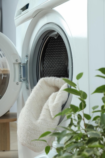 Concept of housework with washing machine close up