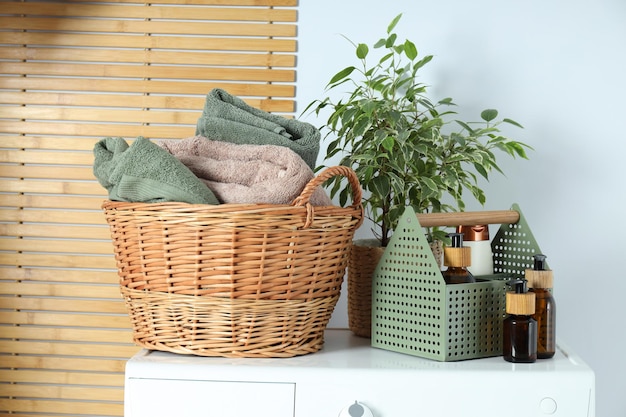 Concept of housework with washing machine on white background