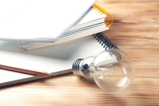 Photo concept idea. lamp on wooden desktop