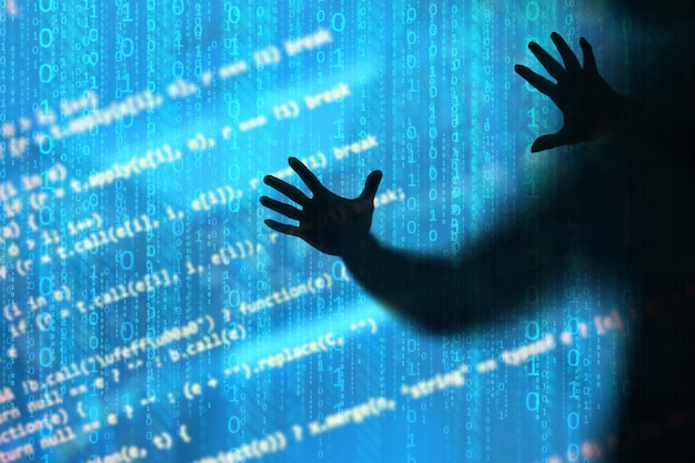 The concept of instability in computer networking Shadow of a thief with binary or digital background stealing information in the network
