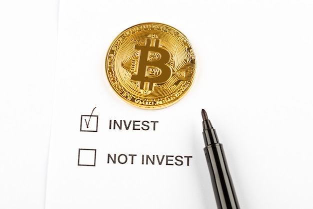 Concept of investing money into bitcoin cryptocurrency 