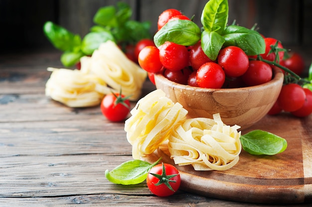 Concept of italian food with pasta and tomato