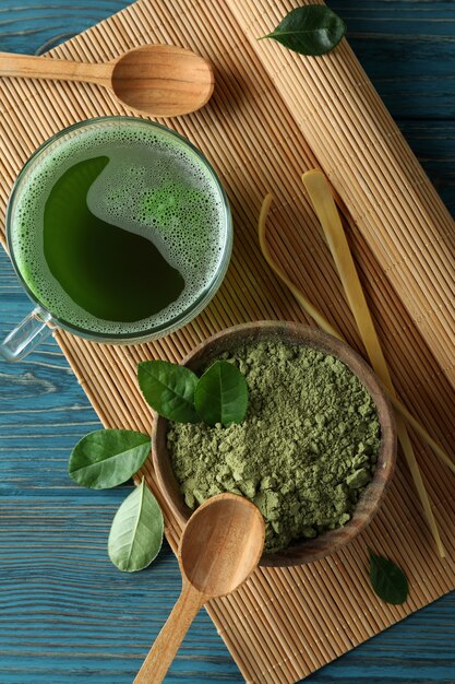 Concept of japanese tea with matcha on blue wooden table