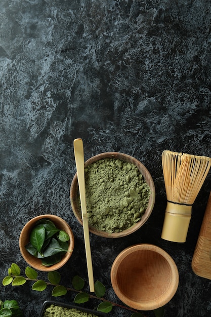 Photo concept of japanese tea with matcha on dark table