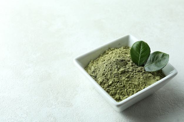 Concept of japanese tea with matcha on white textured table