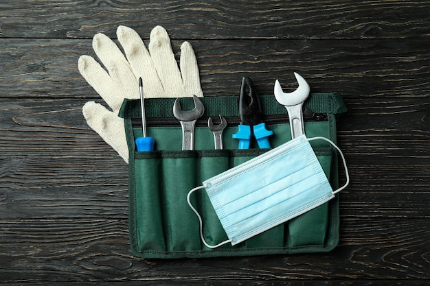 Concept of Labor Day with construction tools on wooden