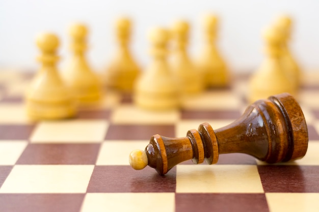 Concept of leadership, success, motivation. Chess pieces on the Board.