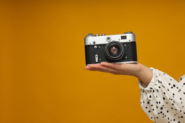 Concept of leisure and photo hobby with retro photo camera