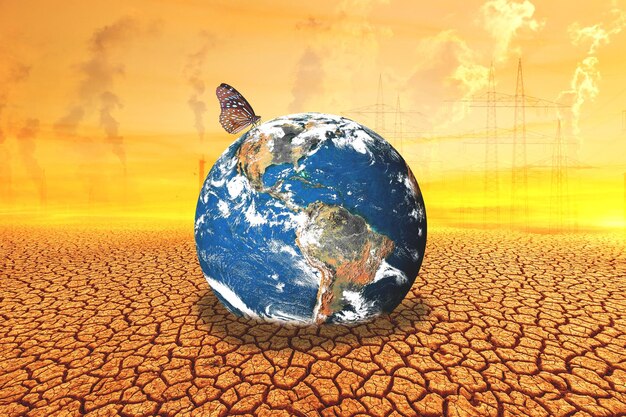 Концепция любви к земле, защиты окружающей среды, изменения окружающей среды, земного шара на бесплодной земле.