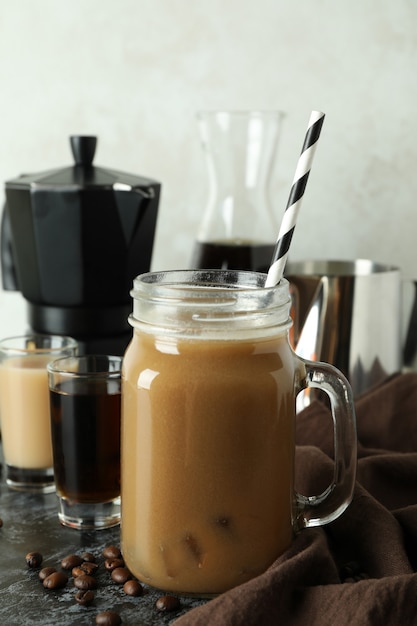 Concept of making Irish coffee on black smokey table