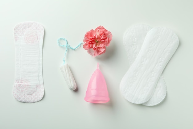 concept of menstruation on white, top view