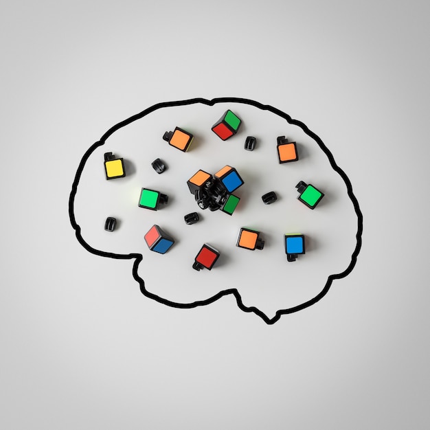 Photo concept of mental health. silhouette of a human brain with a broken puzzle on a gray background.