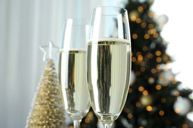 Concept of New Year celebration with glasses of champagne .