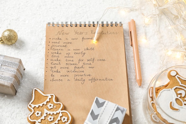 Concept of New Year Resolutions list new year goals close up