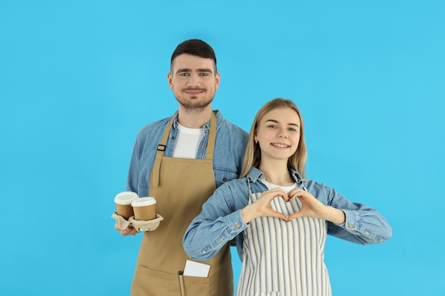 Concept of occupation waiters on blue background