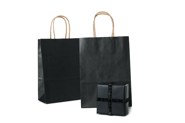 ブラック フライデー セール黒バッグと白い背景で隔離のギフト ボックスの概念