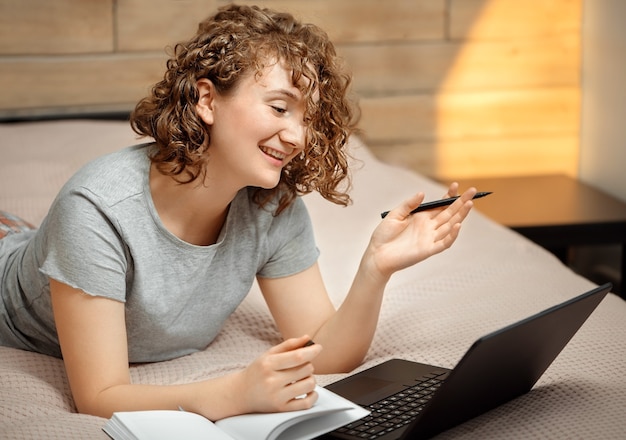 The concept of online learning The girl conducts online negotiations