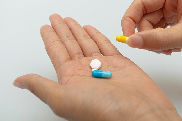 Concept on the palm of the hand for taking various pills