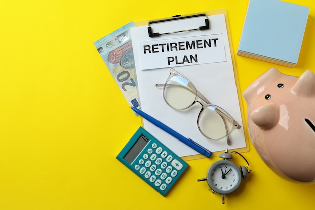 Concept of pension or retirement plan on yellow background