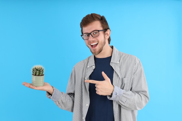 Concept of people with young man on blue background