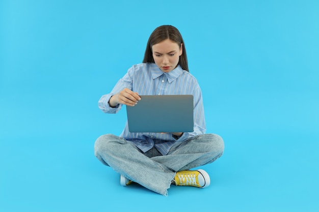 Concept of people young woman on blue background