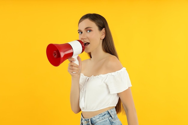 Concept of people young woman on yellow background