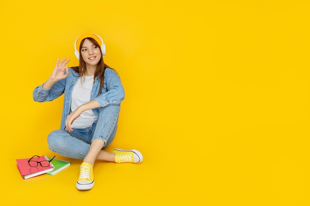 Concept of people young woman on yellow background