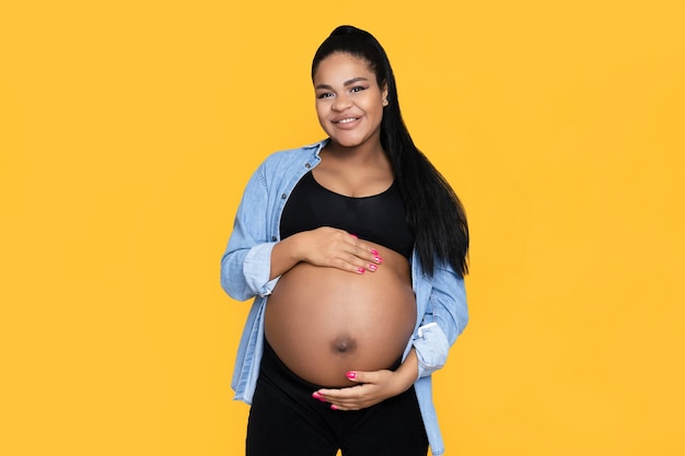 Premium Photo | Concept of pregnancy and maternity with african american  woman