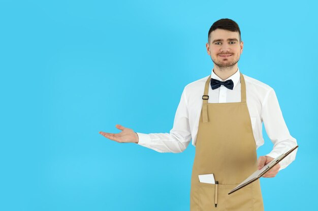 Concept of profession with young man waiter