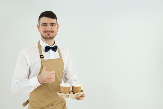 Concept of profession with young man waiter