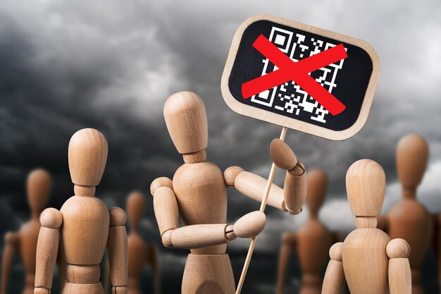 Photo concept of protest against the introduction of qr codes