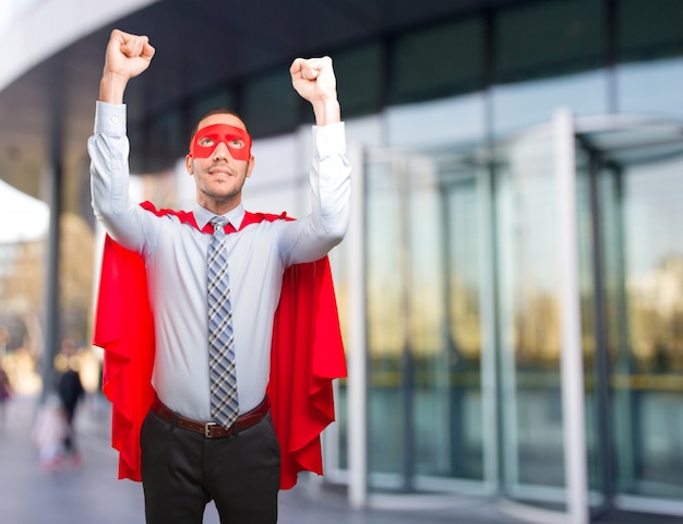 Photo concept of a proud super businessman flying