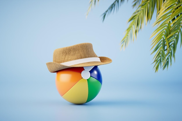 ビーチでのリラクゼーションのコンセプトで、帽子とヤシの木が置かれた膨脹可能な色とりどりのボール