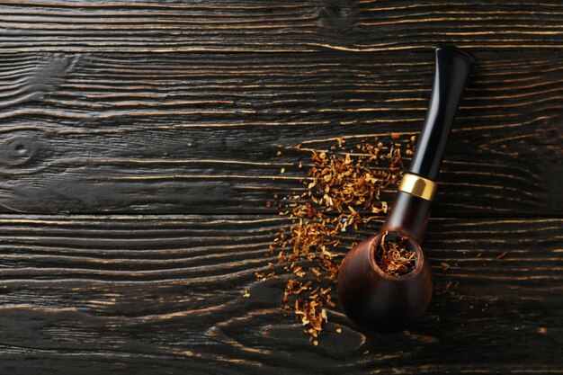 Photo concept of relaxing smoking pipe space for text