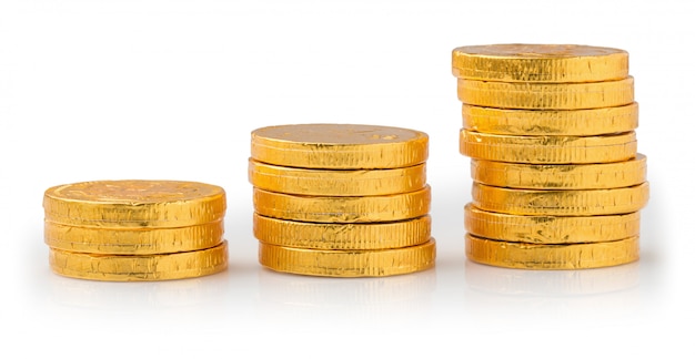 Concept Success in Business, Stack of Gold Coins isolated on a white background