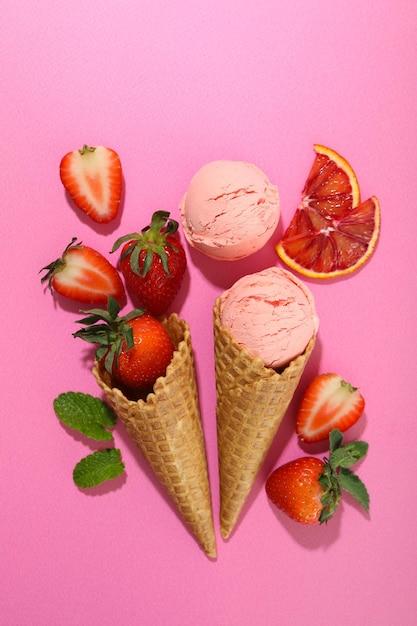 Concept of summer food ice cream on pink background