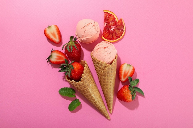 Concept of summer food ice cream on pink background