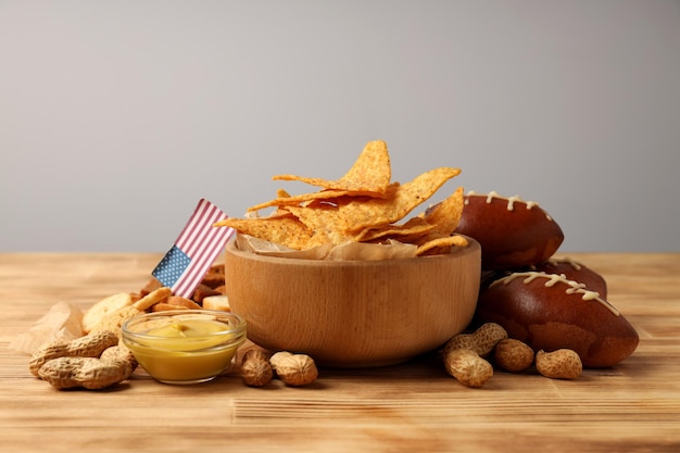 Concept of Super bowl snacks on wooden table